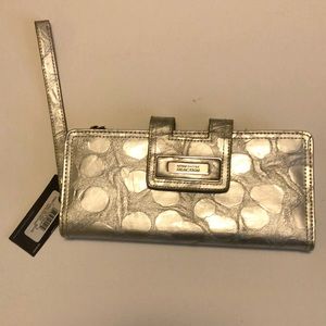 Kenneth Cole silver clutch with strap
